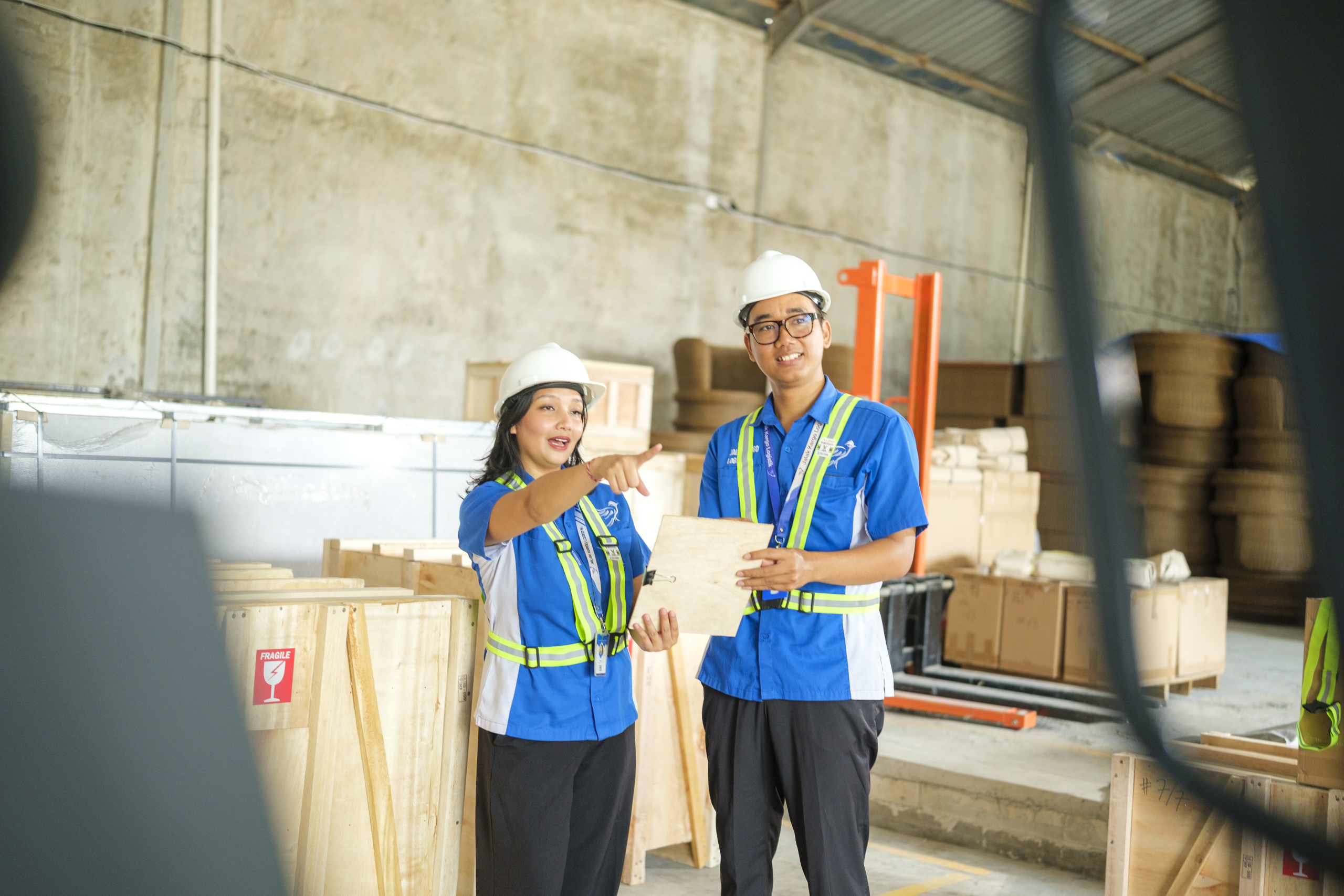 Freight forwarder staff checking cargo documents in Bali